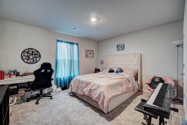 carpeted bedroom with visible vents