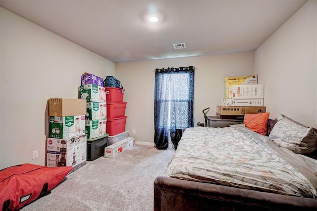 bedroom with carpet floors and visible vents