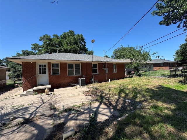 6718 NW 29th St, Bethany, OK 73008 - rear view of property featuring brick siding