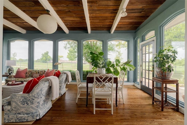 sunroom / solarium with wood ceiling, beamed ceiling, french doors, and wood finished floors