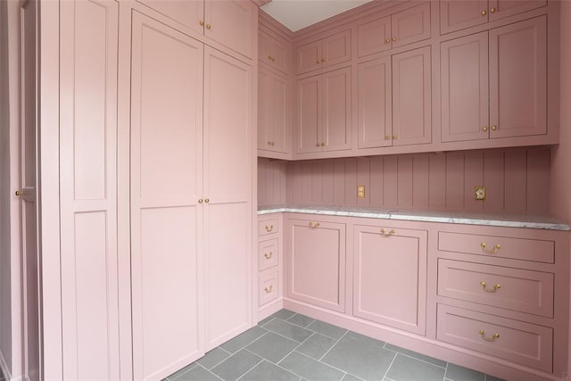 kitchen with light tile patterned floors