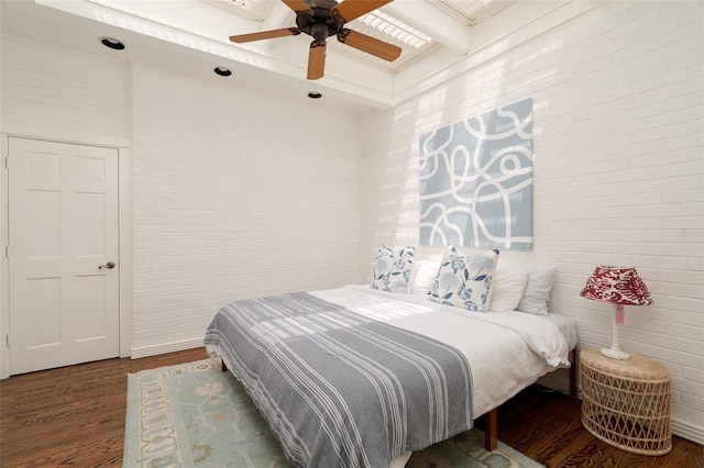 bedroom featuring ceiling fan and wood finished floors