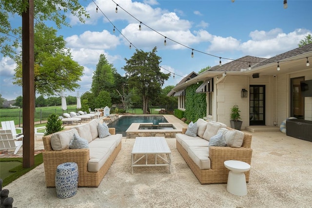 view of patio with an outdoor hangout area, fence, and an outdoor pool