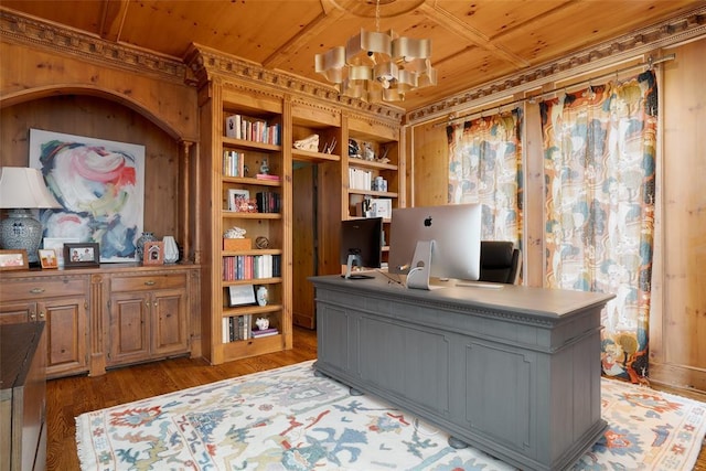 home office featuring wood ceiling, ornamental molding, wood walls, and wood finished floors