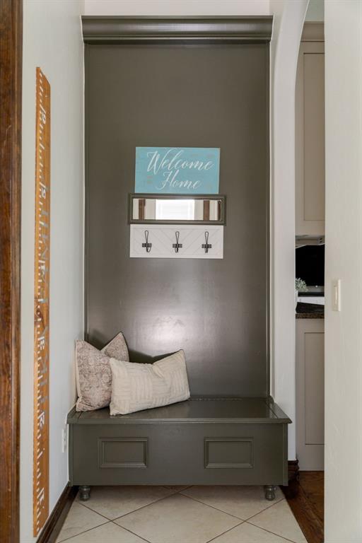 4301 Frisco Bridge Blvd, Edmond, OK 73034 - mudroom featuring light tile patterned floors and arched walkways