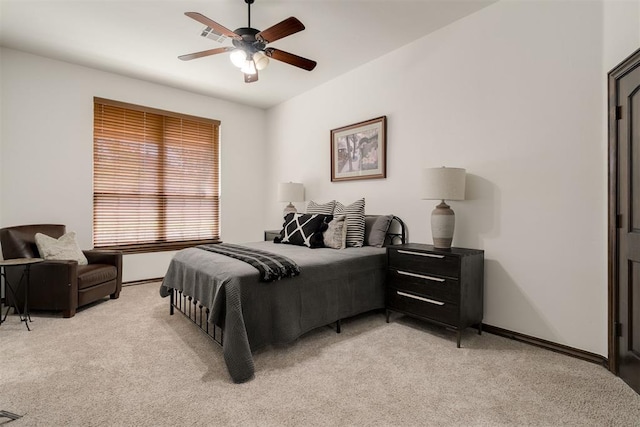 4301 Frisco Bridge Blvd, Edmond, OK 73034 - bedroom featuring light colored carpet, baseboards, and a ceiling fan