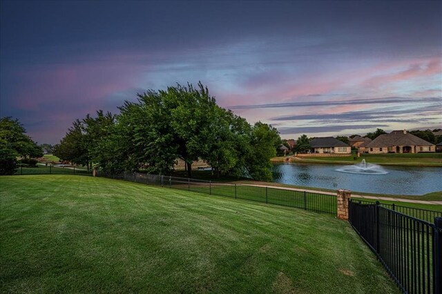 4400 The Ranch Rd, Edmond, OK 73034 - view of yard featuring fence and a water view