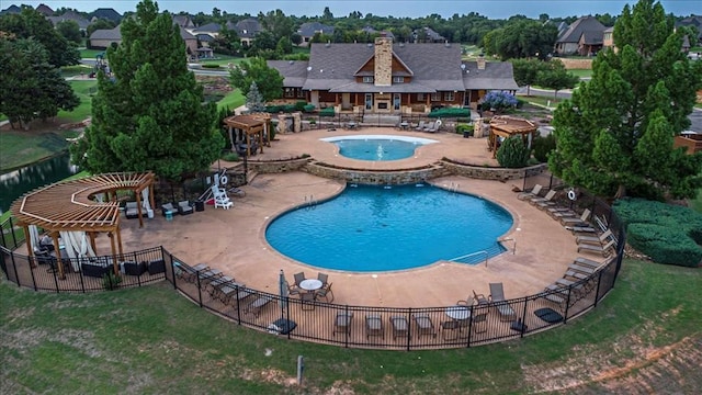 4400 The Ranch Rd, Edmond, OK 73034 - pool featuring a pergola, a patio, a hot tub, and fence