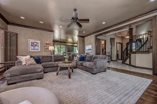 4400 The Ranch Rd, Edmond, OK 73034 - living room with recessed lighting, ceiling fan, crown molding, stairs, and wood finished floors