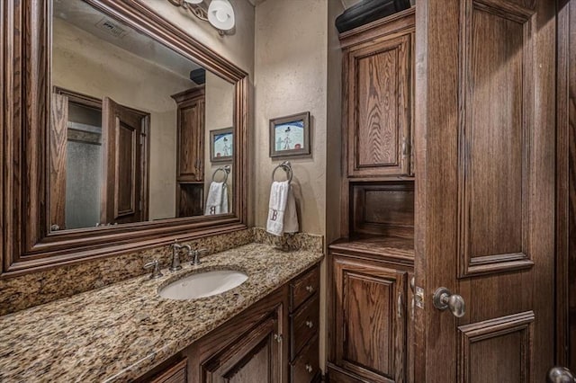 4400 The Ranch Rd, Edmond, OK 73034 - bathroom featuring visible vents and vanity