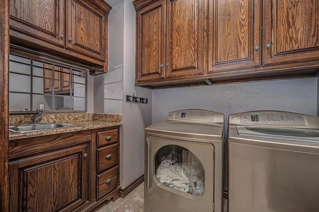 4400 The Ranch Rd, Edmond, OK 73034 - washroom with washer and dryer, cabinet space, and a sink