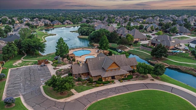4400 The Ranch Rd, Edmond, OK 73034 - aerial view at dusk with a water view and a residential view