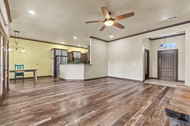 212 SW 144th, Oklahoma City, OK 73170 - unfurnished living room with crown molding, dark wood-style flooring, ceiling fan, baseboards, and recessed lighting