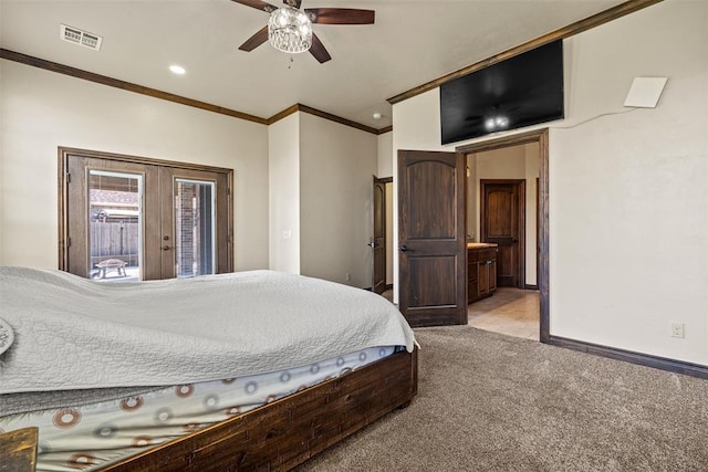 212 SW 144th, Oklahoma City, OK 73170 - carpeted bedroom featuring access to exterior, crown molding, baseboards, ensuite bathroom, and a ceiling fan