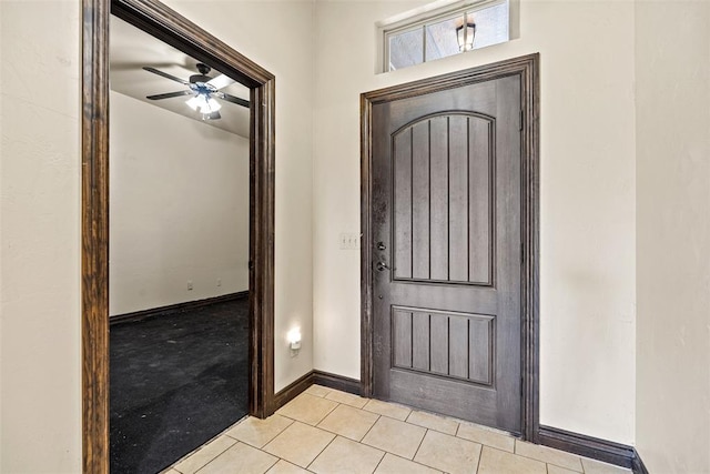 212 SW 144th, Oklahoma City, OK 73170 - foyer entrance featuring tile patterned flooring, a ceiling fan, and baseboards