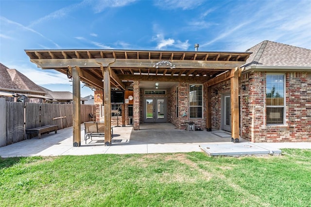 212 SW 144th, Oklahoma City, OK 73170 - rear view of house with french doors, brick siding, and a patio area