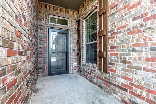 212 SW 144th, Oklahoma City, OK 73170 - property entrance with brick siding and covered porch
