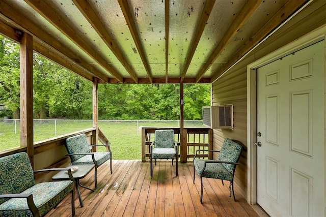 deck featuring a lawn and a fenced backyard