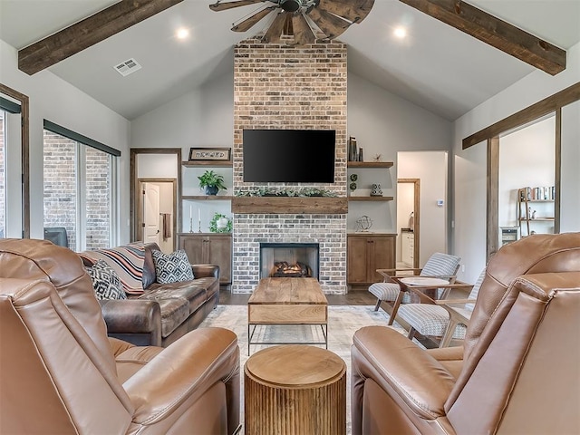 3345 Red Ridge Dr, Blanchard, OK 73010 - living room with ceiling fan, high vaulted ceiling, beam ceiling, a brick fireplace, and light wood finished floors