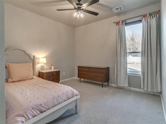 3345 Red Ridge Dr, Blanchard, OK 73010 - bedroom featuring carpet floors, baseboards, and a ceiling fan