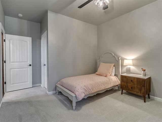 3345 Red Ridge Dr, Blanchard, OK 73010 - carpeted bedroom with baseboards and a ceiling fan