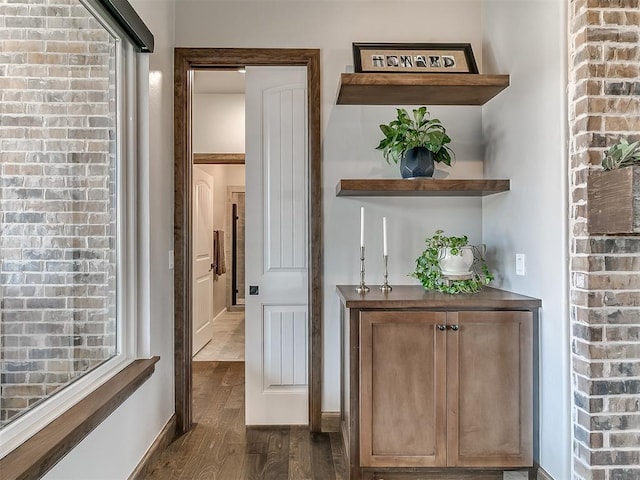 3345 Red Ridge Dr, Blanchard, OK 73010 - corridor featuring dark wood finished floors and baseboards