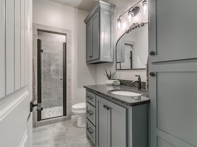 3345 Red Ridge Dr, Blanchard, OK 73010 - full bathroom featuring a shower stall, toilet, and vanity