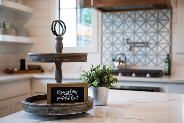 interior details featuring white cabinetry
