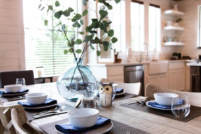 dining area with a healthy amount of sunlight and wood finished floors