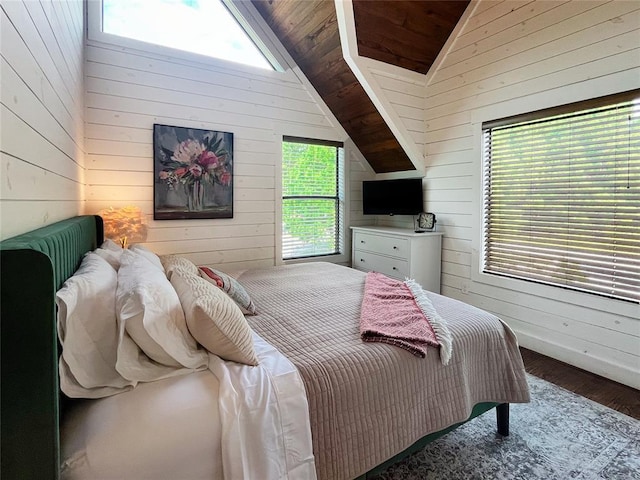 bedroom with wooden ceiling, wood walls, wood finished floors, and lofted ceiling