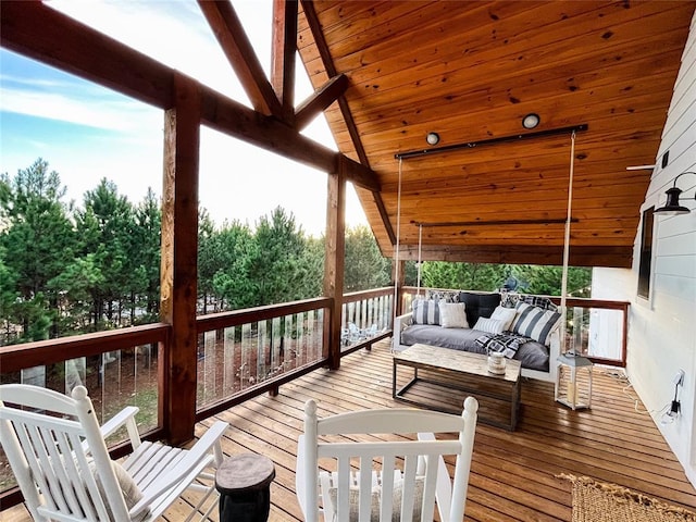 wooden deck featuring an outdoor living space