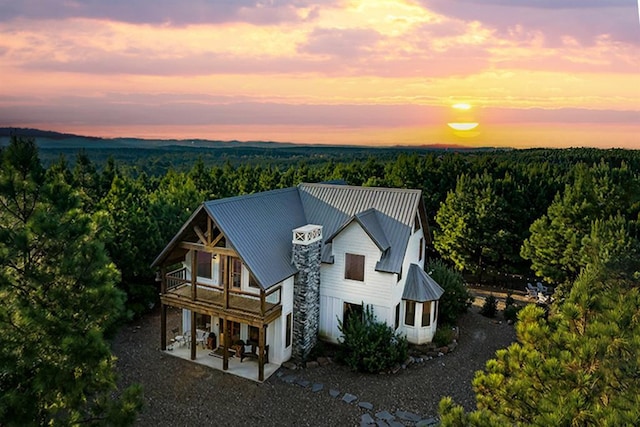 aerial view featuring a view of trees