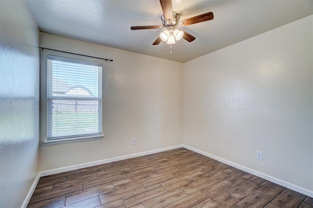4709 SE 81st St, Oklahoma City, OK 73135 - spare room featuring wood finished floors, a ceiling fan, and baseboards