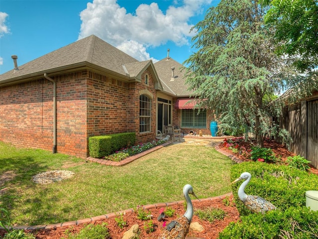 12304 N St Lukes Ln, Oklahoma City, OK 73142 - back of house featuring brick siding and a shingled roof