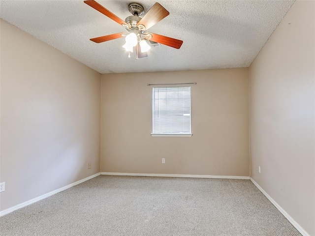 1703 Surrey Pl, Norman, OK 73071 - empty room featuring carpet flooring, a ceiling fan, a textured ceiling, and baseboards