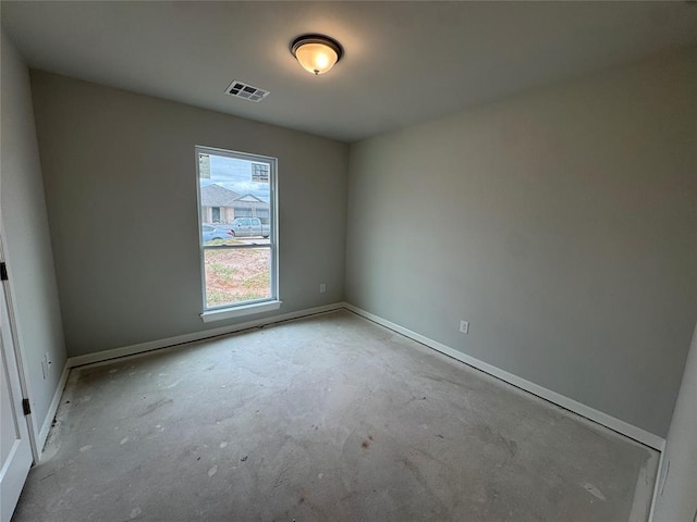 20640 Brush Creek Blvd, Harrah, OK 73045 - empty room featuring unfinished concrete floors and baseboards