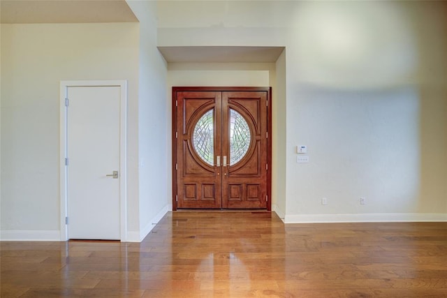508 Manor Hill Ct, Norman, OK 73072 - entrance foyer with baseboards and wood finished floors