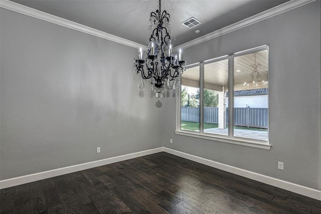 unfurnished dining area with crown molding, a chandelier, visible vents, dark wood-style floors, and baseboards