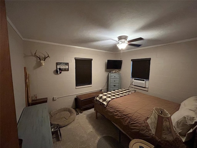 bedroom with crown molding, cooling unit, and concrete block wall