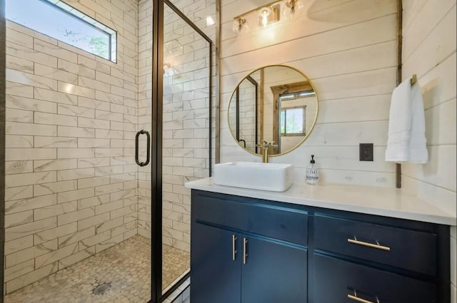 full bath featuring vanity and a stall shower