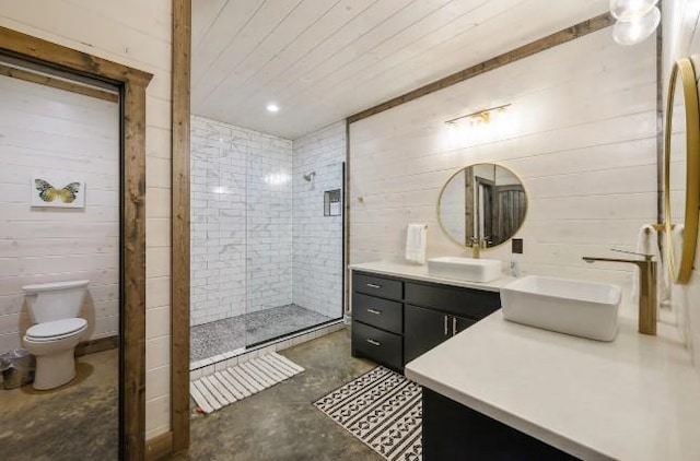 bathroom featuring concrete floors, a stall shower, vanity, wood ceiling, and toilet