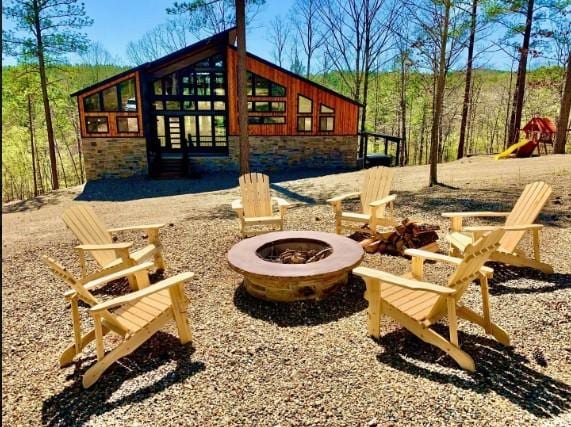 view of patio featuring an outdoor fire pit