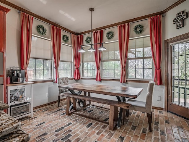 10711 Crystal Creek Dr, Mustang, OK 73064 - dining room with baseboards and brick floor