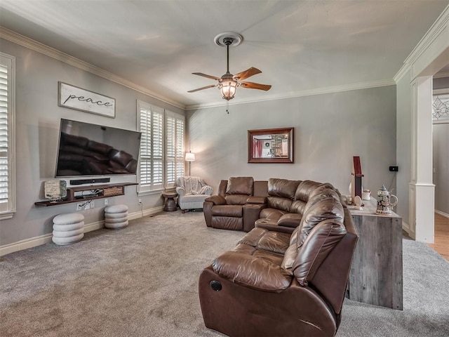 10711 Crystal Creek Dr, Mustang, OK 73064 - carpeted living area with ceiling fan, baseboards, and crown molding