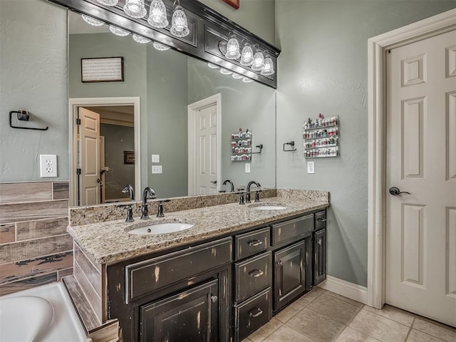 10711 Crystal Creek Dr, Mustang, OK 73064 - full bath featuring a bathtub, tile patterned floors, a sink, and double vanity