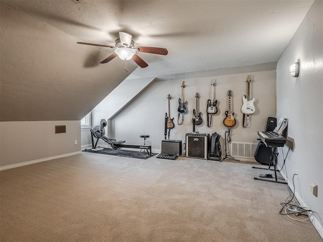 10711 Crystal Creek Dr, Mustang, OK 73064 - exercise area with vaulted ceiling, carpet floors, visible vents, and ceiling fan