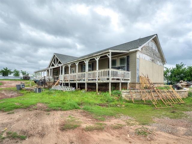 4124 E Horseshoe Ln, Moore, OK 73160 - back of house featuring covered porch and roof with shingles