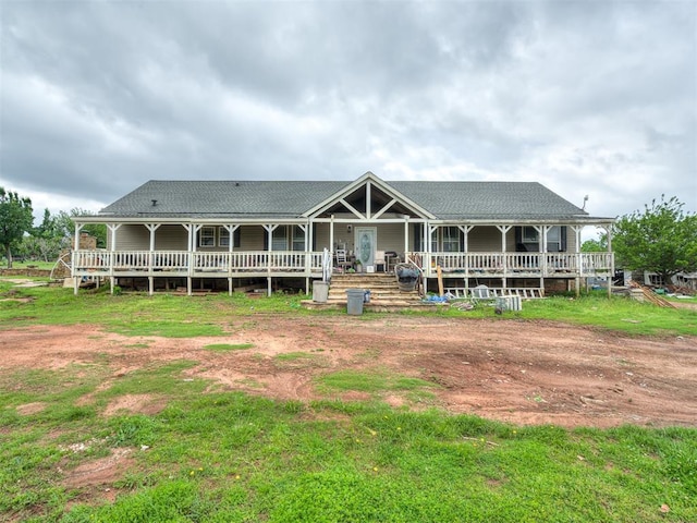 4124 E Horseshoe Ln, Moore, OK 73160 - back of house with roof with shingles and covered porch