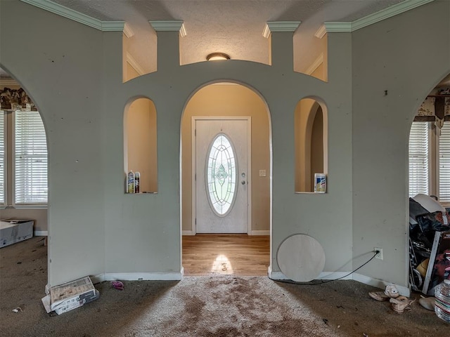 4124 E Horseshoe Ln, Moore, OK 73160 - carpeted foyer entrance with crown molding and baseboards