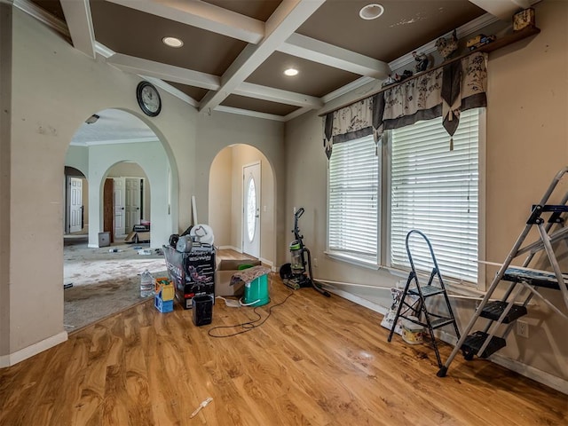 4124 E Horseshoe Ln, Moore, OK 73160 - misc room with arched walkways, baseboards, coffered ceiling, and beam ceiling